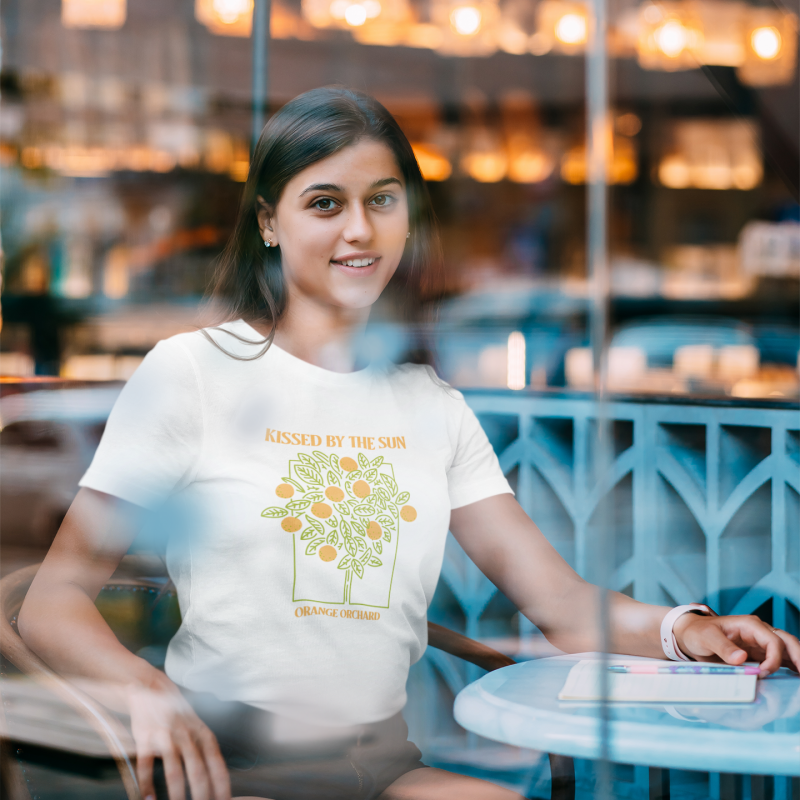 mockup-featuring-a-young-woman-wearing-a-t-shirt-at-a-cafe-42175-r-el2