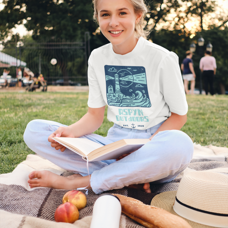 mockup-of-a-teenager-with-a-crewneck-t-shirt-reading-at-the-park-34492-r-el2