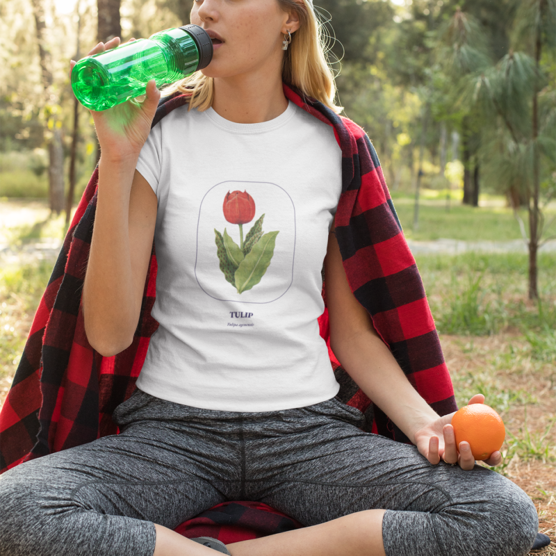 t-shirt-mockup-of-a-woman-at-the-park-drinking-water-32244